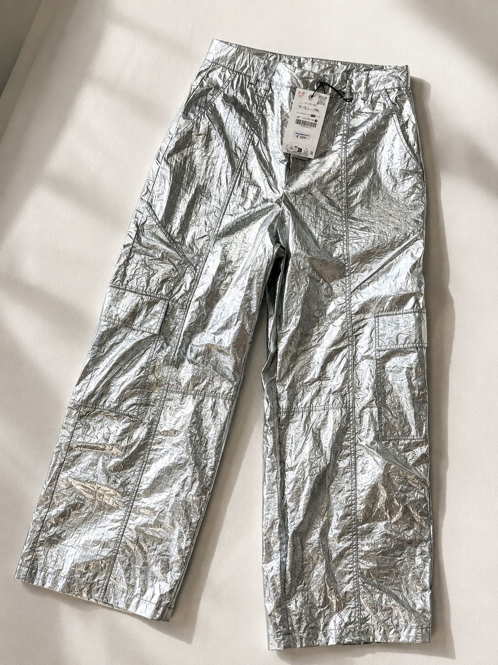 Pantaloni argentati metallizzati effetto lucido – ragazzo/a